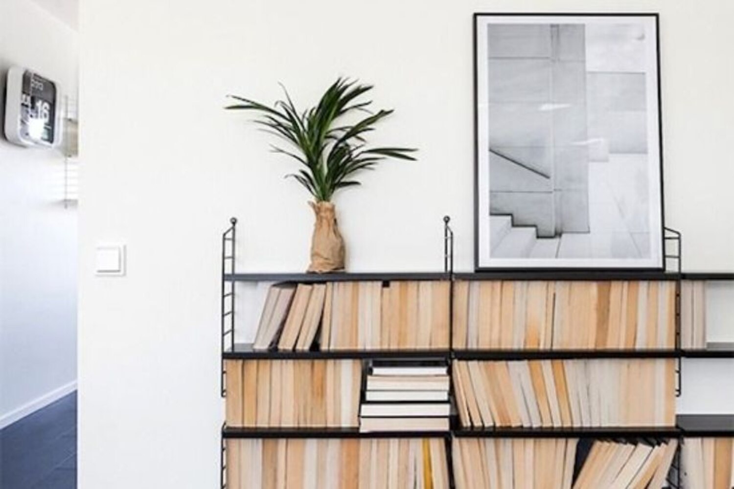 Use This Minimalist Hack For A More Cohesive Bookshelf | Style at Home