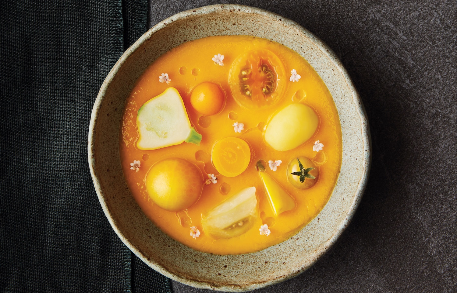 Golden Vegetable Soup With Olive Oil & Basil Blossoms | Style at Home